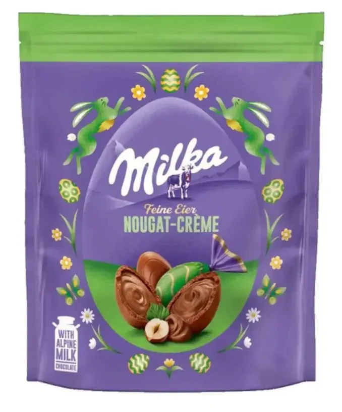 Шоколадні Яйця Великодні Milka Feine Eier Eggs Nougat Creme hazelnuss Мілка альпійський шоколад Нуга та фундук Пакет 90г
