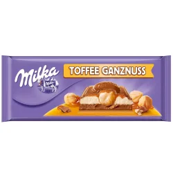 Товар Шоколад молочний плитка Milka Toffee Wholenut Мілка з цільними лісовими горіхами з Карамеллю Тоффі 300г