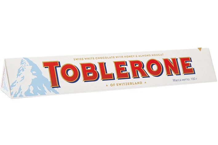 Білий шоколад toblerione з медово-міндальною нугою, 100 г