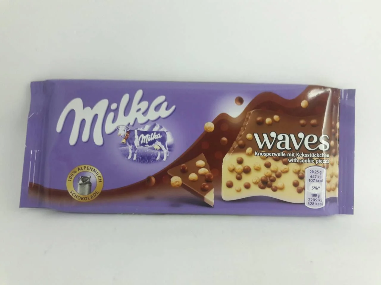 Шоколад milka milka waves cookie з хрусткими кульками.100 грамів