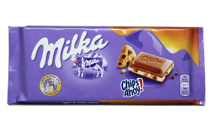 Молочний шоколад Milka зі шматочками печива milka шоколад chips ahoy 100 г.