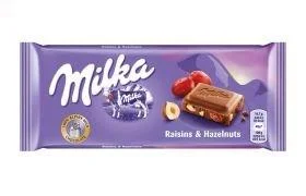 Молочний шоколад Milka мілка з родзинками та фундуком/milka raisin hazelnut 100 г.