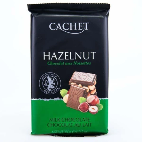 Шоколад Преміум молочний Cachet Whole Hazelnut Milk Chocolate Кашет з цілими лісовими горіхами 300г