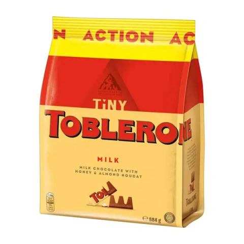 Шоколад молочний трикутний Toblerone Tiny Milk&Honey Chocolate with Almond nougat з медом та мигдальною нугою 73шт 584г